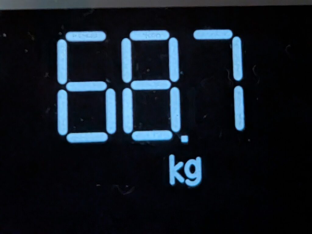68.7 kg