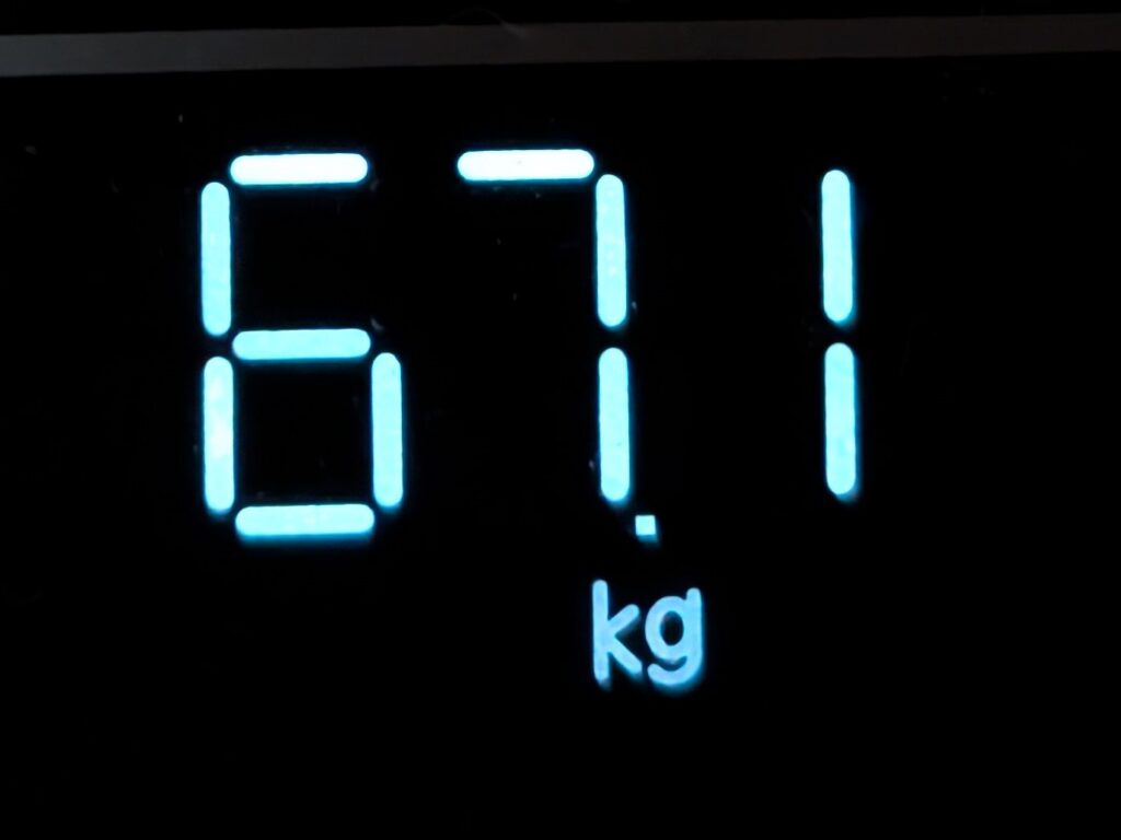 67.1 kg